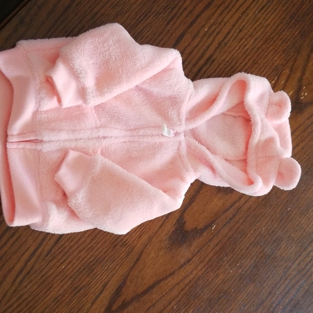 Gently worn fuzzy pink newborn jacket